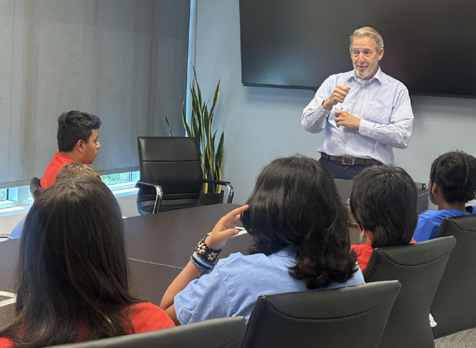 H2scan CEO Dave Meyers kicks off the day with students at H2scan headquarters discussing the importance of STEM.